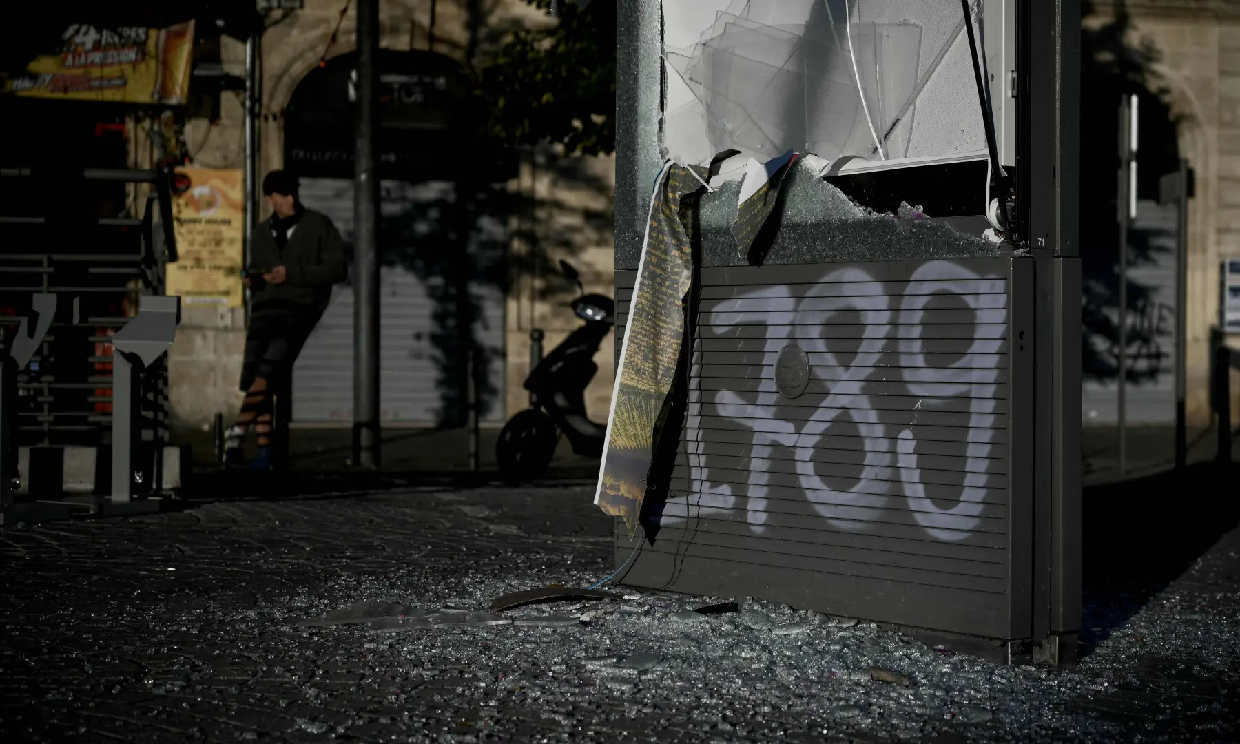  A photograph taken on Oct 18, 2026 shows a damaged, broken-down advertisement board reading &ldquo;1789&rdquo;, the year of the outbreak of the French Revolution, in central Bordeaux, southwestern France, a day after nationwide protests against the &ldquo;high cost of living&rdquo;. &mdash; AFP 