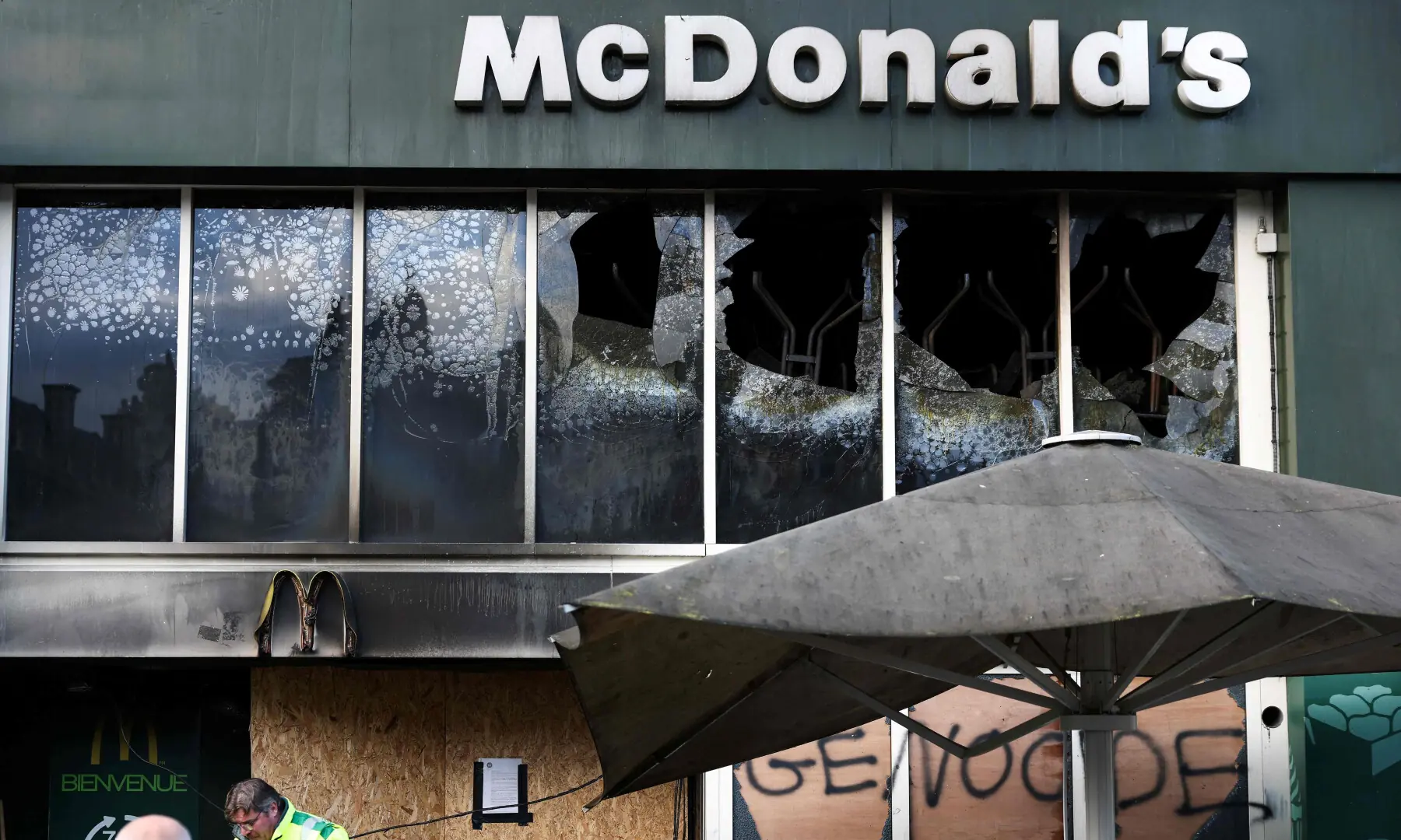  A photograph taken on Oct 18, 2026 shows the frontage window of a &ldquo;McDonald&rdquo; fast food restaurant broken in Lille, northern France, a day after nationwide protests against the &ldquo;high cost of living&rdquo;. &mdash; AFP 
