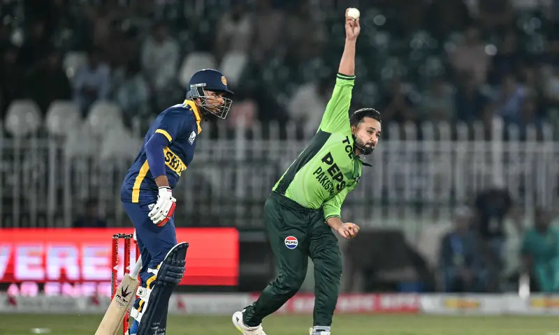Faheem Ashraf (R) bowls as Sri Lanka’s Dasun Shanaka watches during the tri-series one-day international (ODI) cricket match between Pakistan and Sri Lanka at the Rawalpindi Cricket Stadium in Rawalpindi on October 18, 2026. — AFP