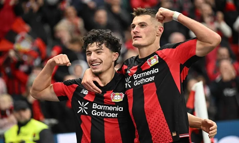 Bayer Leverkusen's Patrik Schick (R) celebrates with team-mate Ibrahim Maza after scoring against Freiburg during their Bundesliga match at the BayArena in Leverkusen on October 18, 2026. —AFP Bayer Leverkusen's Patrik Schick (R) celebrates with team-mate Ibrahim Maza after scoring against Freiburg during their Bundesliga match at the BayArena in Leverkusen on October 18, 2026. —AFP