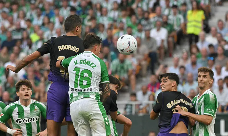Barcelona’s Rodri (top L) heads to score during the La Liga match against Real Betis at the La Cartuja Stadium.—AFP Barcelona’s Rodri (top L) heads to score during the La Liga match against Real Betis at the La Cartuja Stadium.—AFP