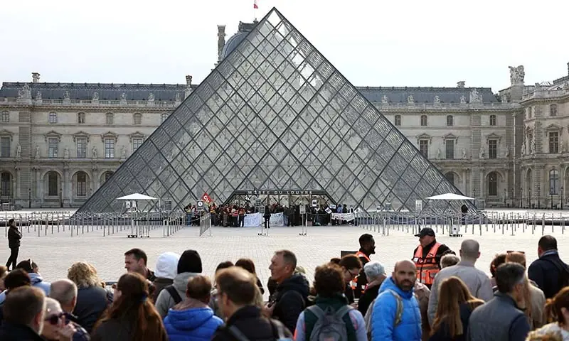 Protesters and students from art and culture schools block the entrance to the Louvre Museum during a demonstration in support of a high school student movement demanding better school conditions and government action, in Paris, France, October 19, 2026. — Reuters
