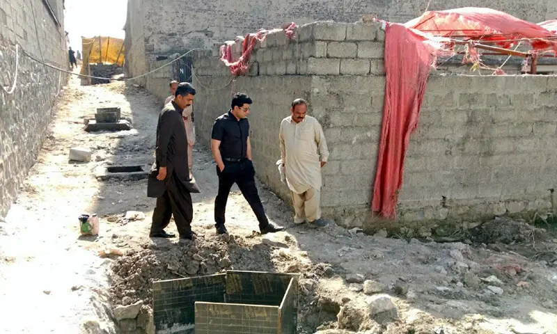 Assistant Commissioner Dr Mohammad Anas Saeed reviews work on sewerage system project in Taxila on Monday. — Dawn Assistant Commissioner Dr Mohammad Anas Saeed reviews work on sewerage system project in Taxila on Monday. — Dawn