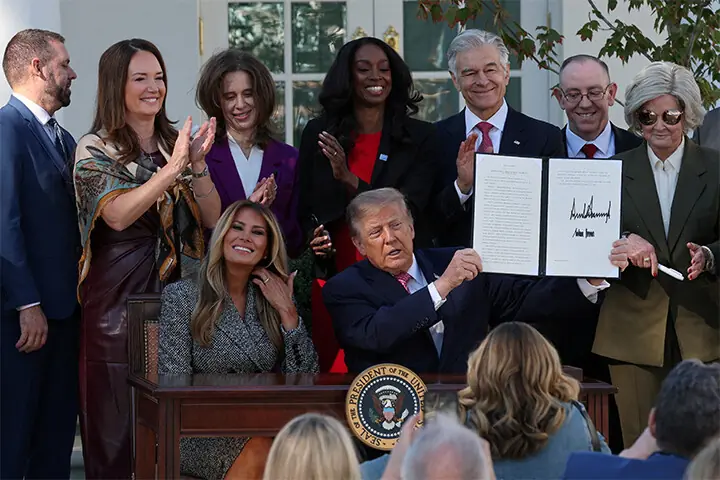 PRESIDENT Donald Trump shows the executive order, with his and the First Lady’s signatures, in the Rose Garden at the White House. —Reuters PRESIDENT Donald Trump shows the executive order, with his and the First Lady’s signatures, in the Rose Garden at the White House. —Reuters