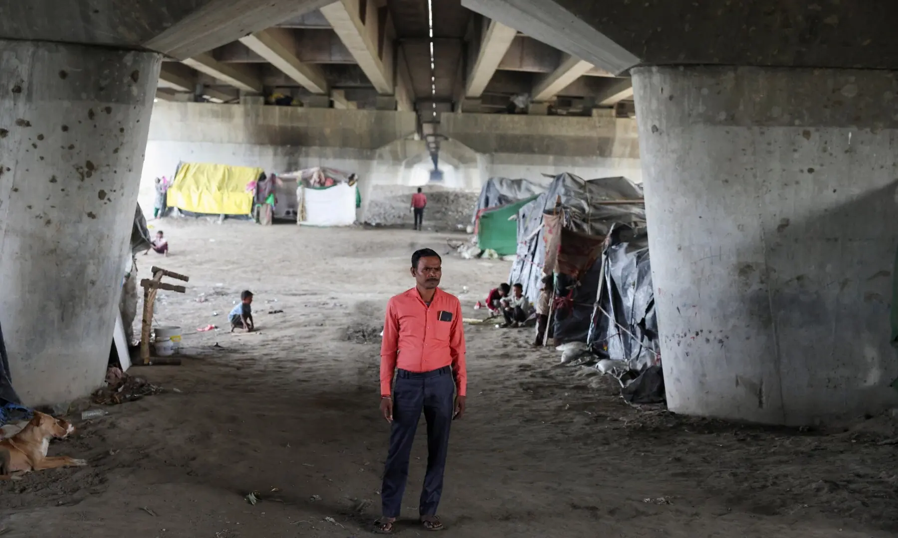 Kamal Lal, 38, a teacher and voter who says his name was removed from the voter list and is placed in the Permanently Shifted category in the Special Intensive Revision (SIR) list, stands below a flyover in New Delhi, India on October 16, 2026. —Reuters