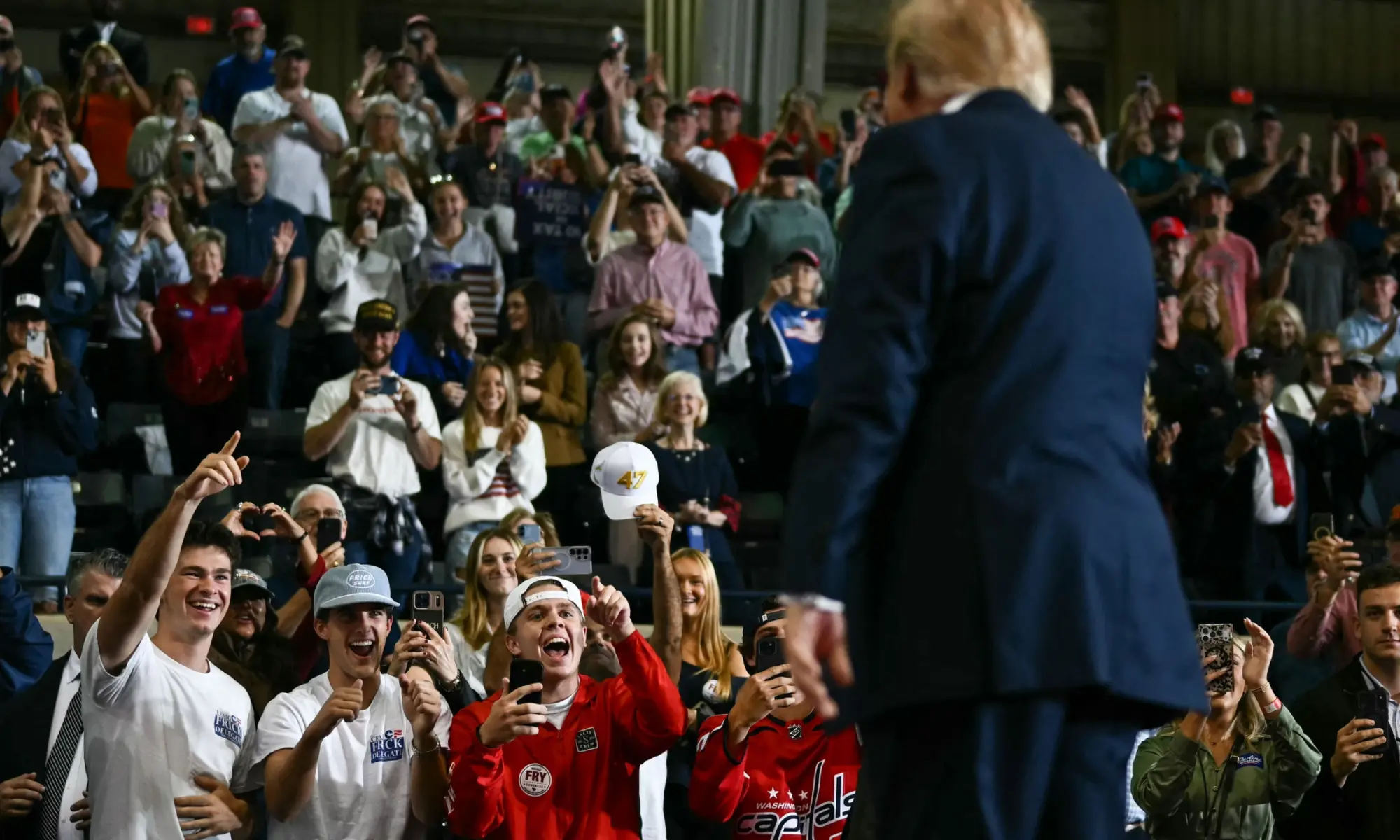 Attendees cheer as US President Donald Trump leaves after speaking at a campaign rally at T. Ed Garrison Arena in Pendleton, South Carolina on October 21, 2026. —Reuters