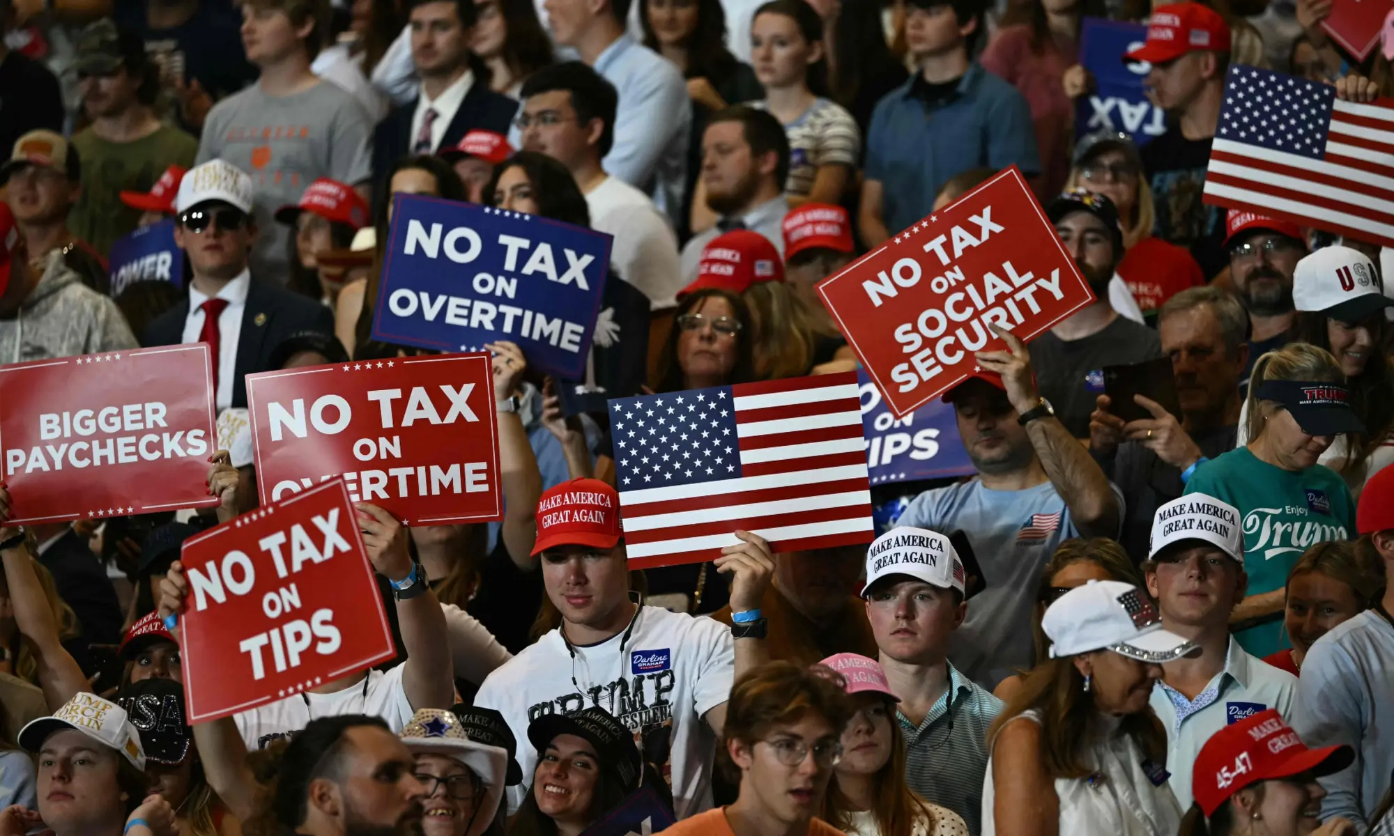 Supporters wait for US President Donald Trump to speak during a campaign rally at T. Ed Garrison Arena in Pendleton, South Carolina on October 21, 2026. —AFP