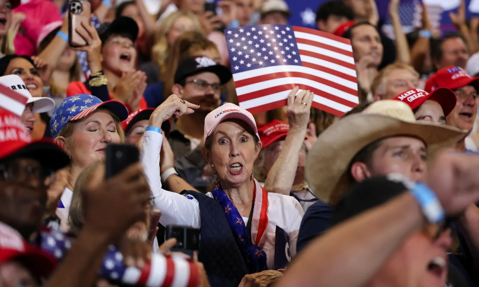 A woman points at her Trump hat during a rally by US President Donald Trump in support of Republican US Senate candidate Darline Graham ahead of the midterm elections, at T. Ed Garrison Arena at Clemson University in Pendleton, South Carolina, US, October 21. &mdash; Reuters