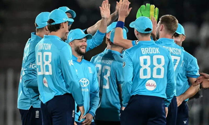 England&rsquo;s players celebrate after the dismissal of Sri Lanka&rsquo;s captain Kusal Mendis during the one-day international tri-series cricket match between England and Sri Lanka at the Rawalpindi Cricket Stadium in Rawalpindi on October 22, 2026. &mdash; AFP
