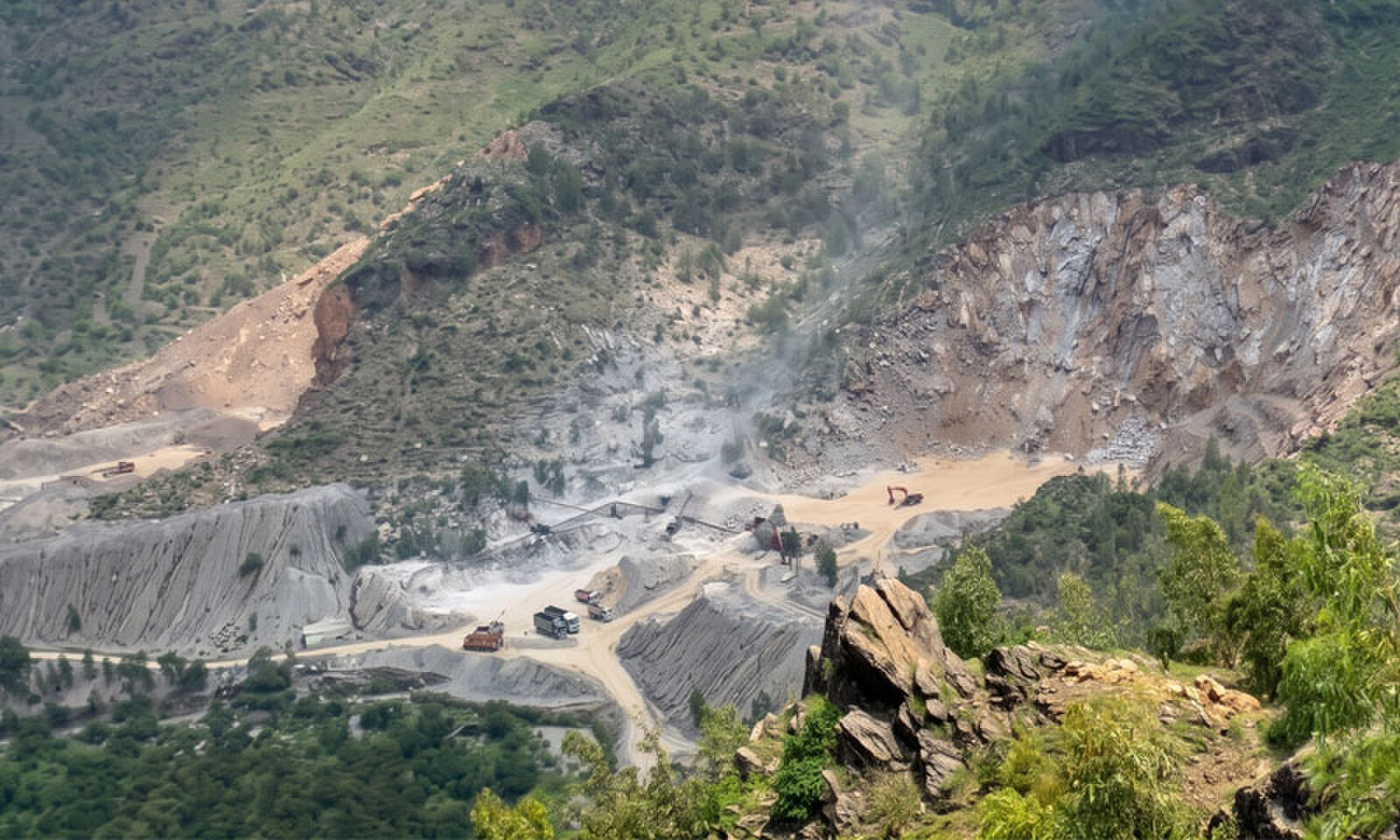 A stone crushing unit near the Swat Motorway tunnel. &mdash; Dawn