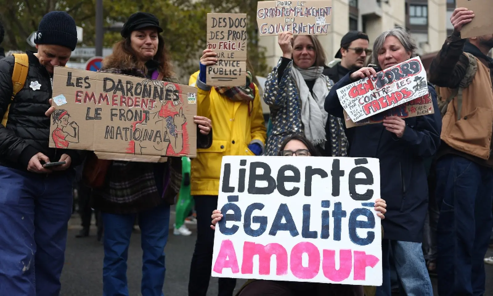 Protesters hold placards during an authorised demonstration organised by labour unions in Paris as part of nationwide protests called by the 'Yellow Vests' movement joined by French high school and university students against the cost of living and rising fuel prices, in France October 24, 2026. The slogan reads 'liberty, equality, love'. — Reuters Protesters hold placards during an authorised demonstration organised by labour unions in Paris as part of nationwide protests called by the 'Yellow Vests' movement joined by French high school and university students against the cost of living and rising fuel prices, in France October 24, 2026. The slogan reads 'liberty, equality, love'. — Reuters