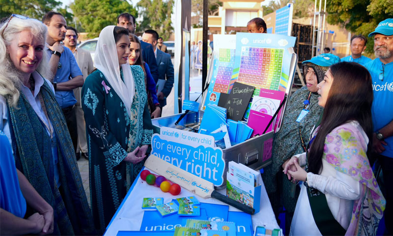 Aseefa Bhutto-Zardari interacts with volunteers at a Unicef stall during an event held to mark United Nations Day 2026.&mdash;Dawn