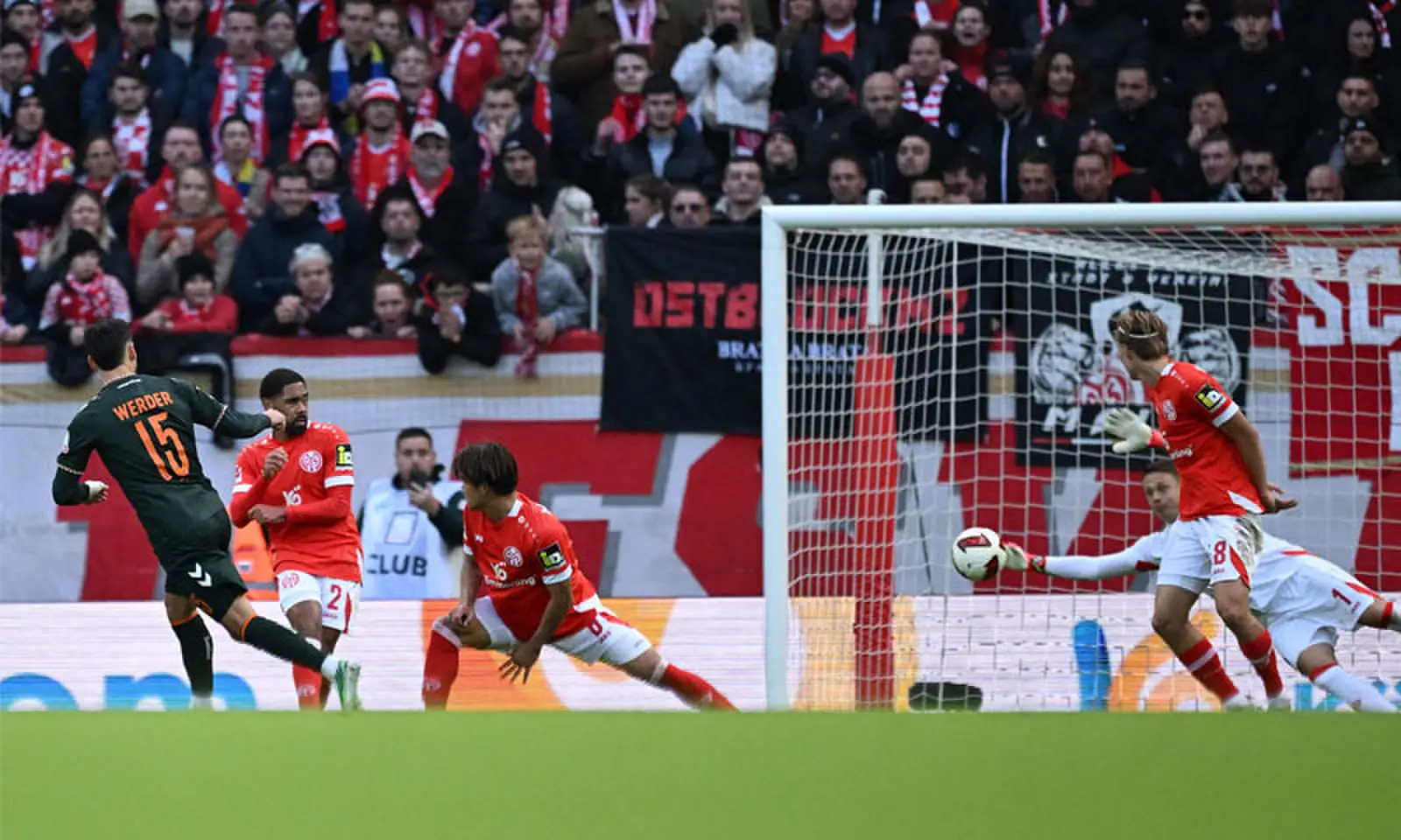 MAINZ: Werder Bremen&rsquo;s Ludovit Reis (L) scores against Mainz during their Bundesliga match at the MEWA Arena on Saturday.&mdash;AFP