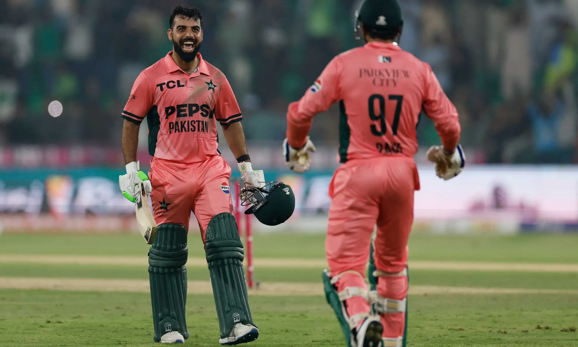 Pakistan all-rounder Shadab Khan (L) and tailender Haris Rauf celebrate the team's win against England in the One-day International tri-series match at the Gaddafi Stadium on October 25, 2026.—Reuters Pakistan all-rounder Shadab Khan (L) and tailender Haris Rauf celebrate the team's win against England in the One-day International tri-series match at the Gaddafi Stadium on October 25, 2026.—Reuters