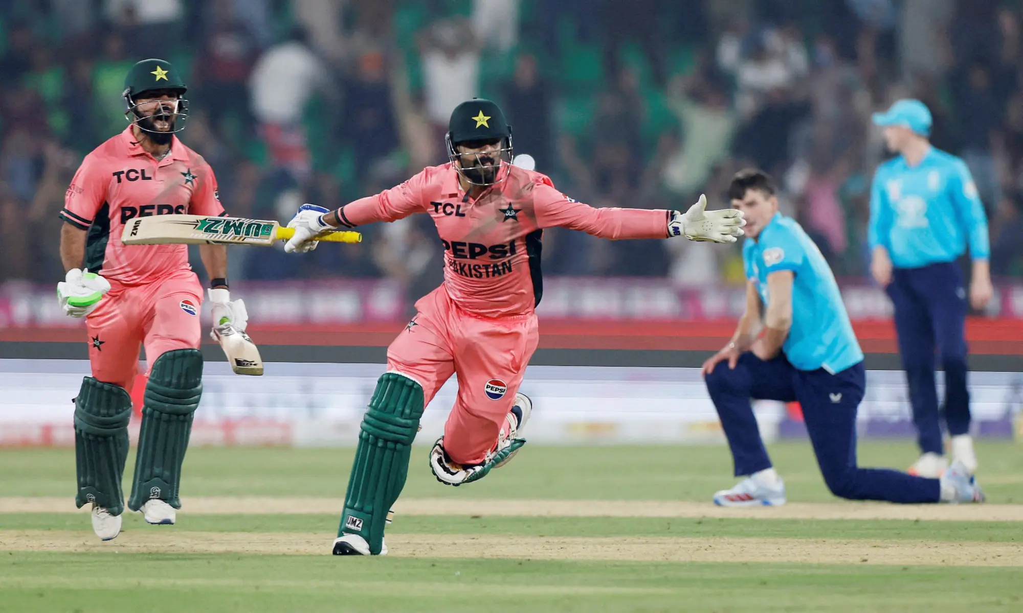 Haris Rauf and Shadab Khan celebrate after the ODI match between Pakistan and England at Gaddafi Stadium in Lahore on Oct 25, 2026. &mdash; Reuters