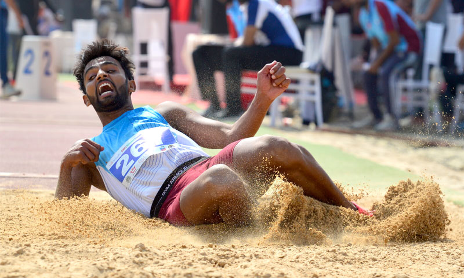 Wapda&rsquo;s Usman Zafar in action during the National Athletics Championship triple jump final at the NED University on Sunday.&mdash;Tahir Jamal/White Star