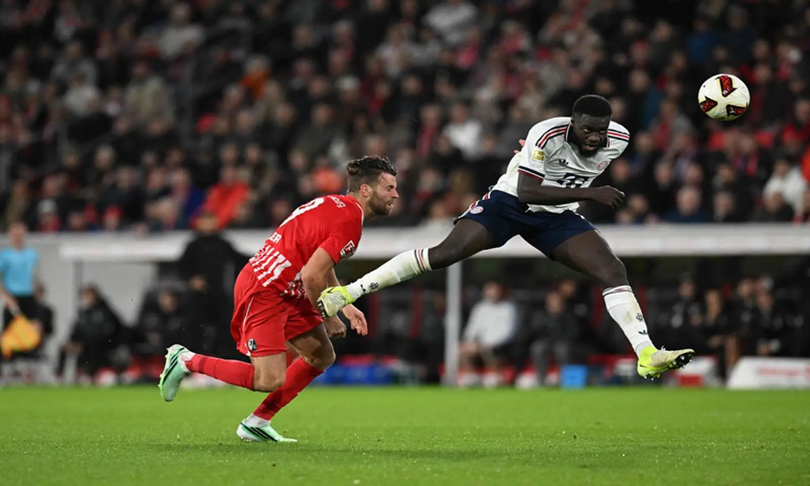 Bayern Munich's Dayot Upamecano (R) heads the ball during the German Bundesliga match against Freiburg at Europa Park Stadion in Freiburg on October 25, 2026. —AFP Bayern Munich's Dayot Upamecano (R) heads the ball during the German Bundesliga match against Freiburg at Europa Park Stadion in Freiburg on October 25, 2026. —AFP