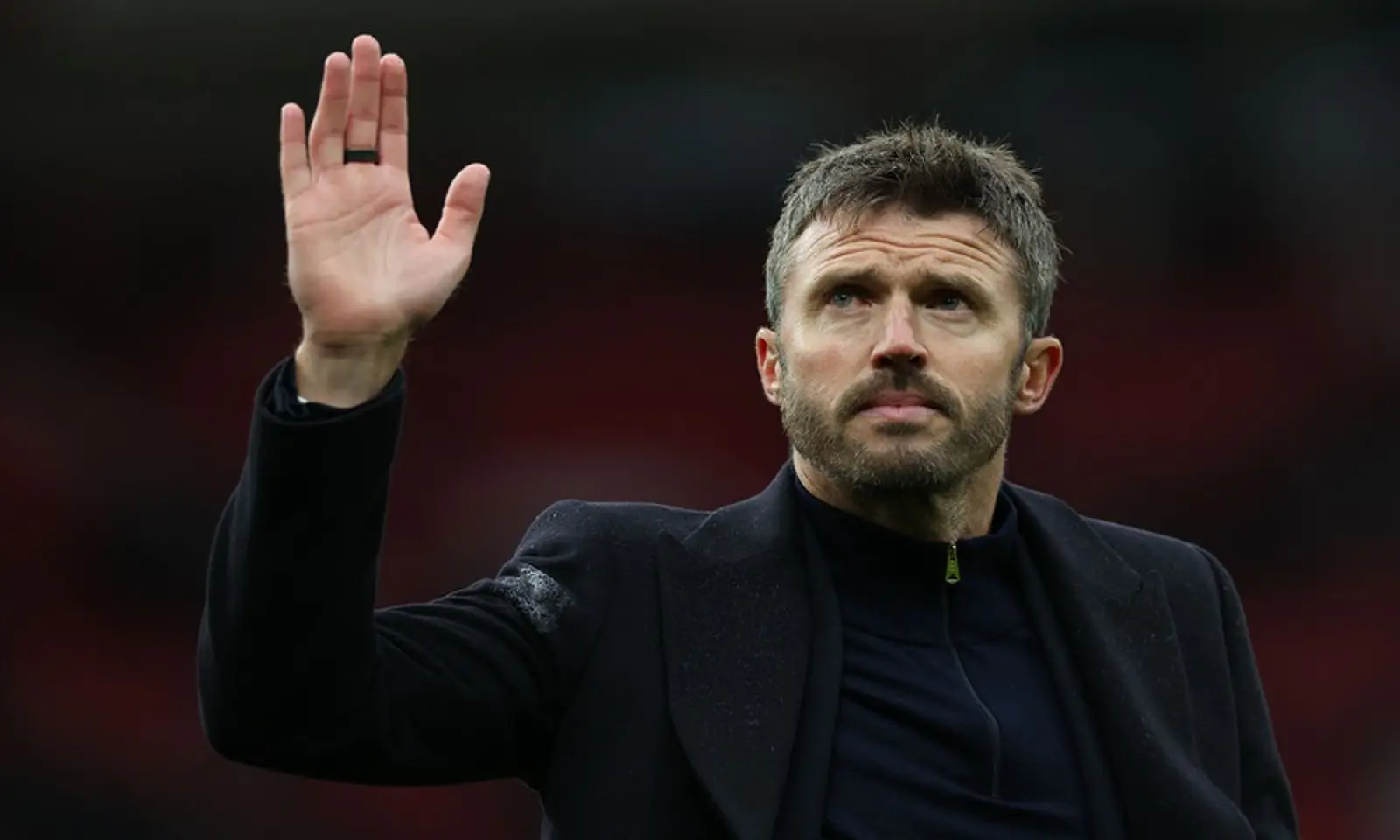 Manchester United's head coach Michael Carrick gestures to fans after the English Premier League match against Bournemouth at Old Trafford in Manchester on October 25, 2026. &mdash;AFP
