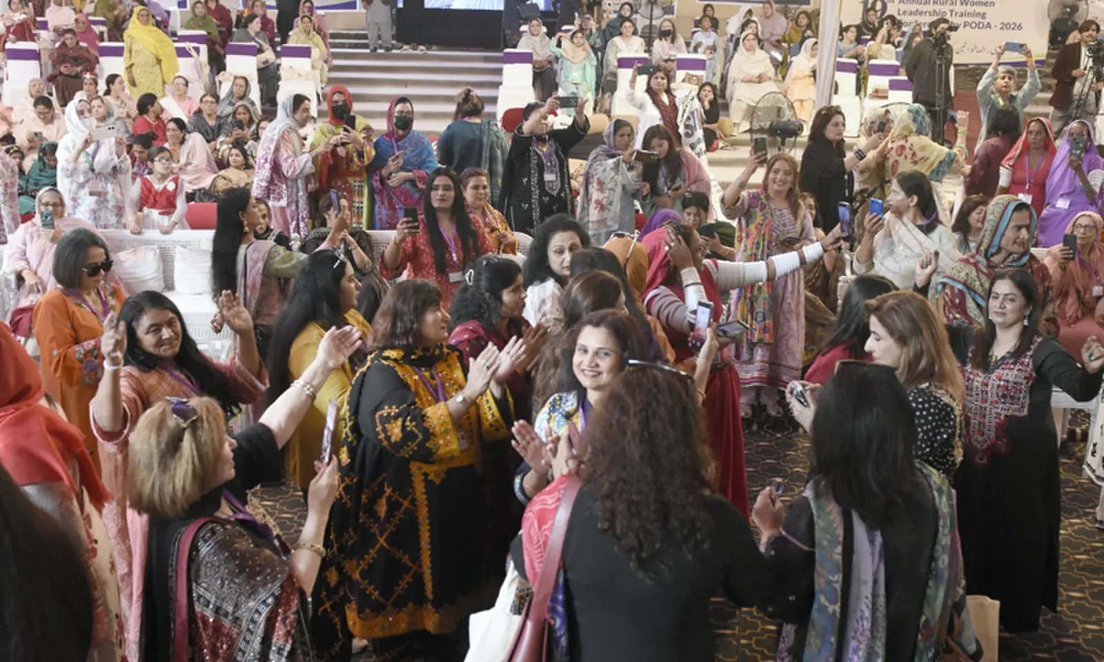 Women delegates dance during the opening of three-day 19th Annual Rural Women Leadership Training Conference organised by Poda-Pakistan in Islamabad on Tuesday. — Photo by Tanveer Shahzad Women delegates dance during the opening of three-day 19th Annual Rural Women Leadership Training Conference organised by Poda-Pakistan in Islamabad on Tuesday. — Photo by Tanveer Shahzad
