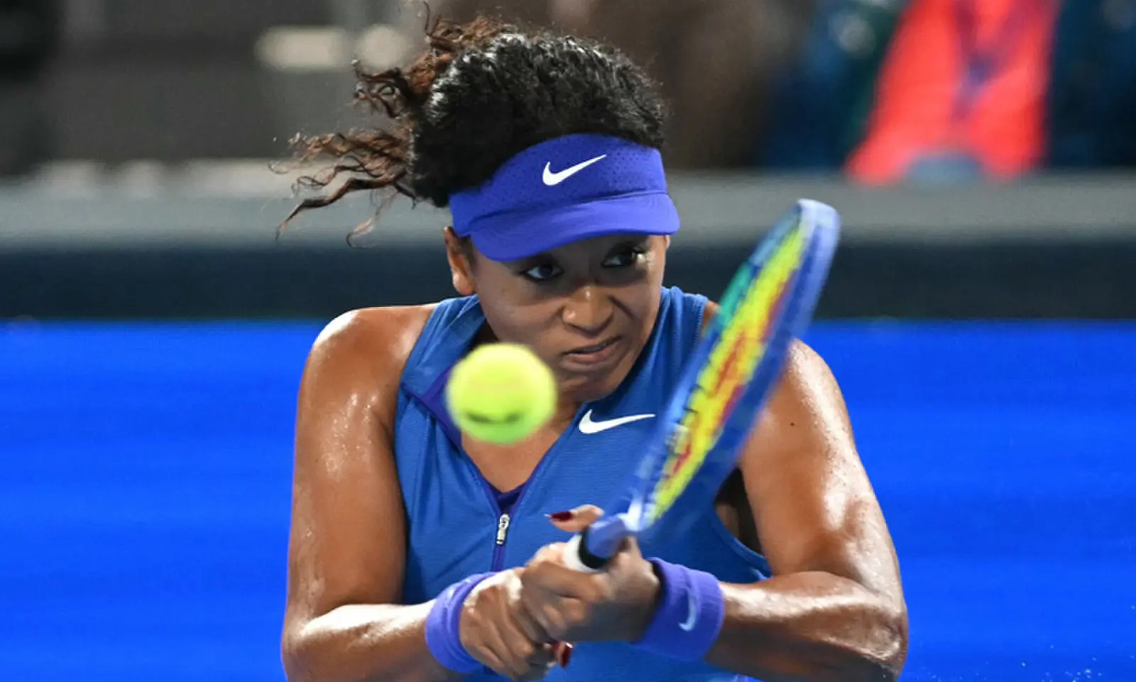 JAPAN’S Naomi Osaka hits a return against Jasmine Paolini of Italy during their Japan Open round-of-32 match at the Ariake Coliseum on Tuesday.—AFP JAPAN’S Naomi Osaka hits a return against Jasmine Paolini of Italy during their Japan Open round-of-32 match at the Ariake Coliseum on Tuesday.—AFP