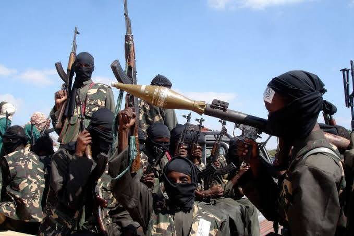 Mogadishu: A Sept 3, 2011, file photo shows members of Al Qaeda-linked Al Shabaab militia parade after distributing relief to famine-stricken internally displaced people at Ala Yaasir camp, near the Somali capital.—Reuters/File Mogadishu: A Sept 3, 2011, file photo shows members of Al Qaeda-linked Al Shabaab militia parade after distributing relief to famine-stricken internally displaced people at Ala Yaasir camp, near the Somali capital.—Reuters/File