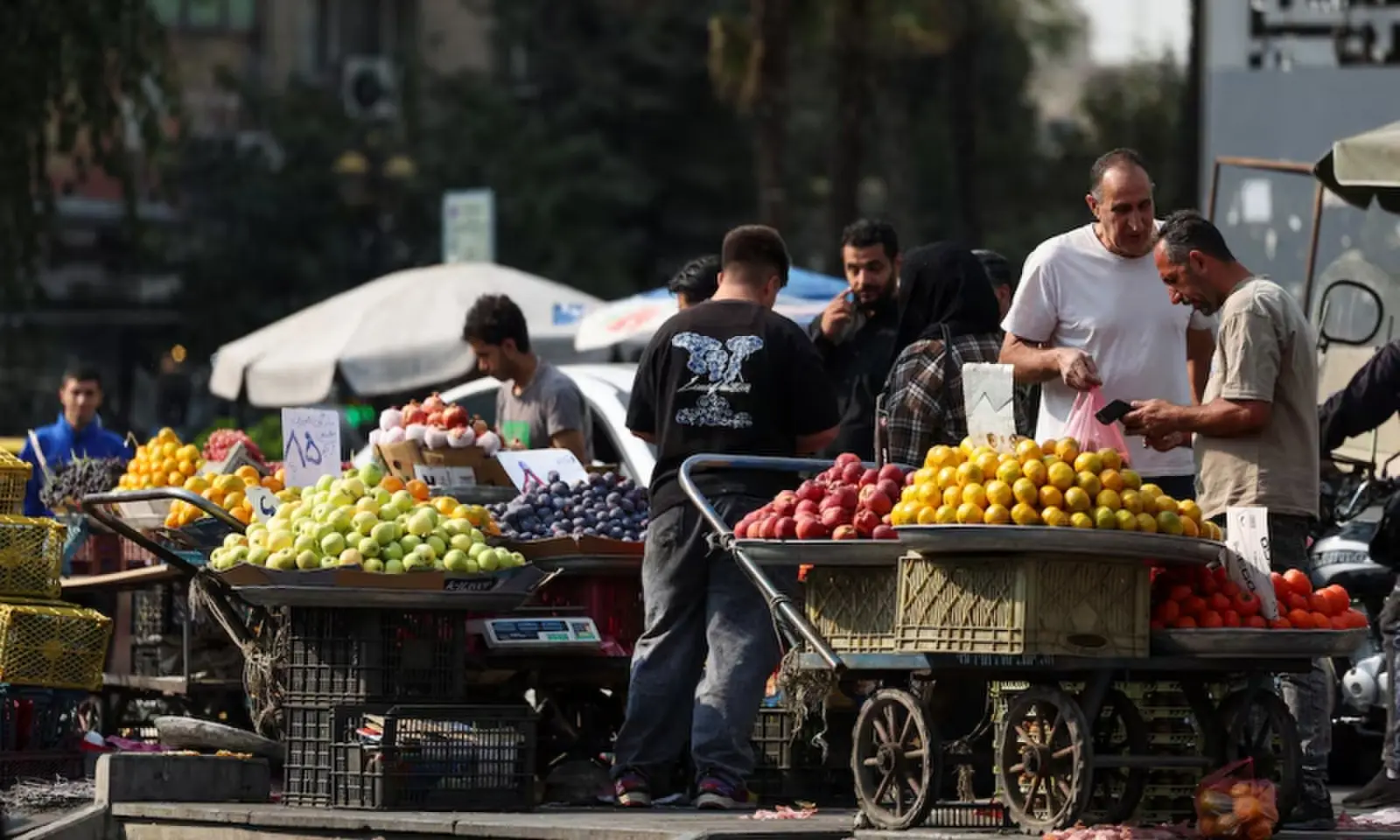People shop at a local market in Tehran, Iran on October 27, 2026. — Reuters