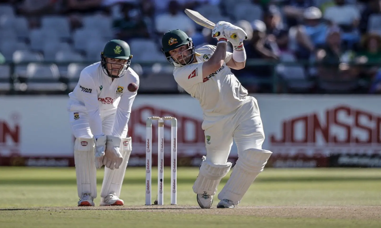 Australian batter Josh Inglis plays a shot as South African wicket-keeper Ryan Rickelton looks on during the third Test at Newlands Stadium in Cape Town, South Africa, on October 28, 2026. —AFP Australian batter Josh Inglis plays a shot as South African wicket-keeper Ryan Rickelton looks on during the third Test at Newlands Stadium in Cape Town, South Africa, on October 28, 2026. —AFP