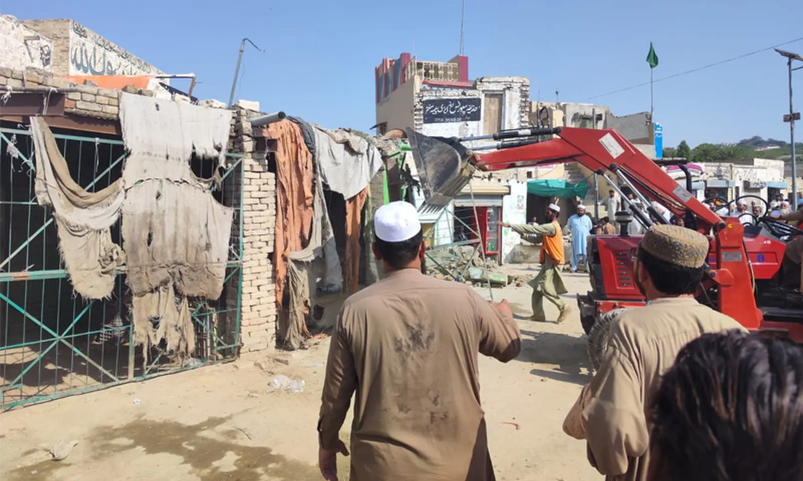 Illegal structures being removed in Darra Pezu, Lakki Marwat, on Wednesday. — Dawn Illegal structures being removed in Darra Pezu, Lakki Marwat, on Wednesday. — Dawn