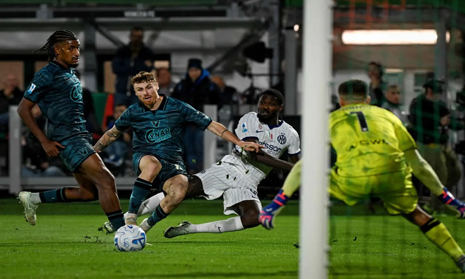 Inter Milan's Marcus Thuram (R) vies for the ball with Venezia's Toma Basic (C) Redouane Halhal during their Italian Serie A match at the Pier Luigi Penzo Stadium in Venice on October 28, 2026. &mdash;AFP