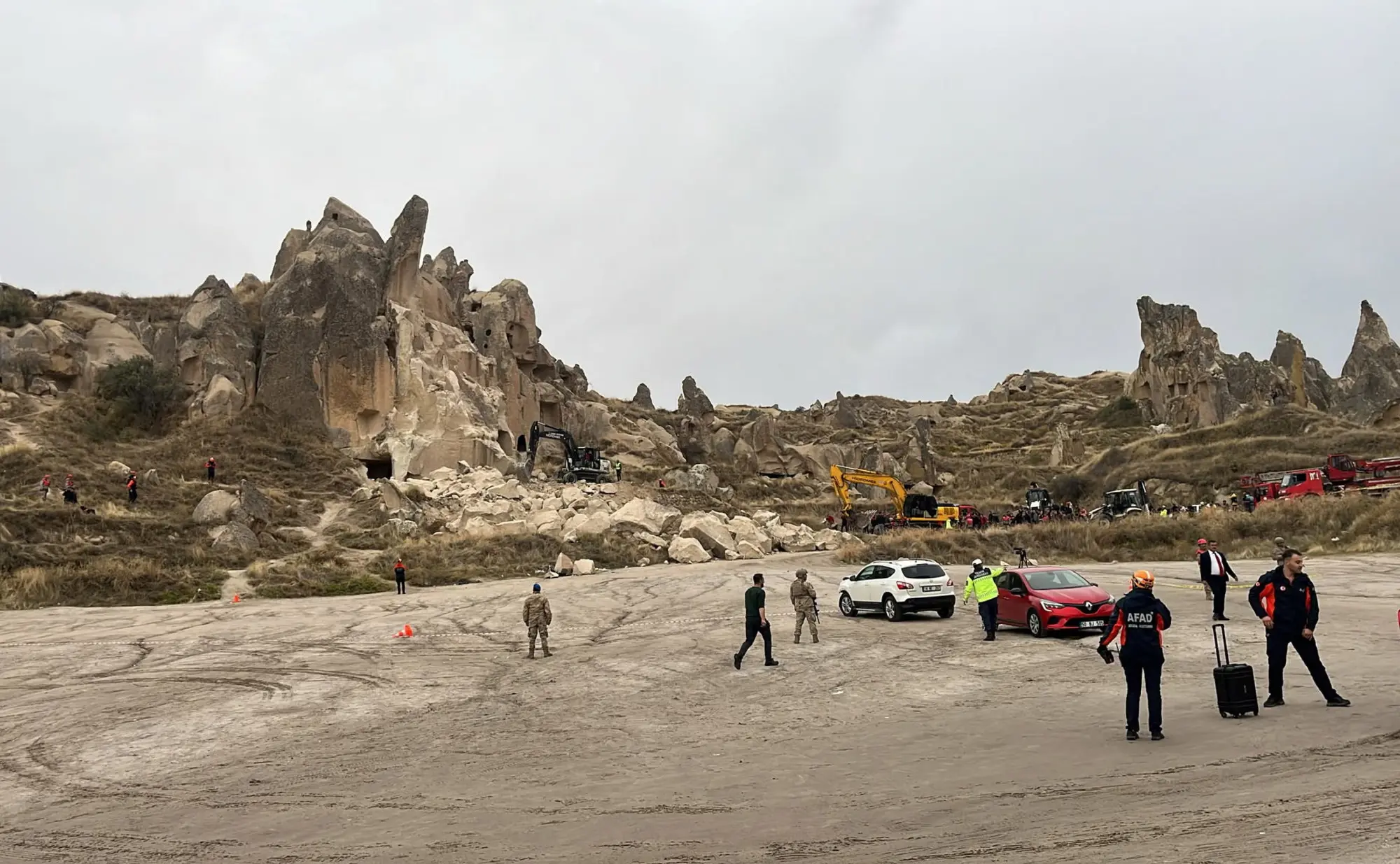 Search and rescue teams work at the scene after rocks fell from a fairy chimney, a volcanic rock formation, following heavy rainfall in Goreme, in the central Cappadocia region, Turkiye on October 29, 2026. &mdash; Reuters