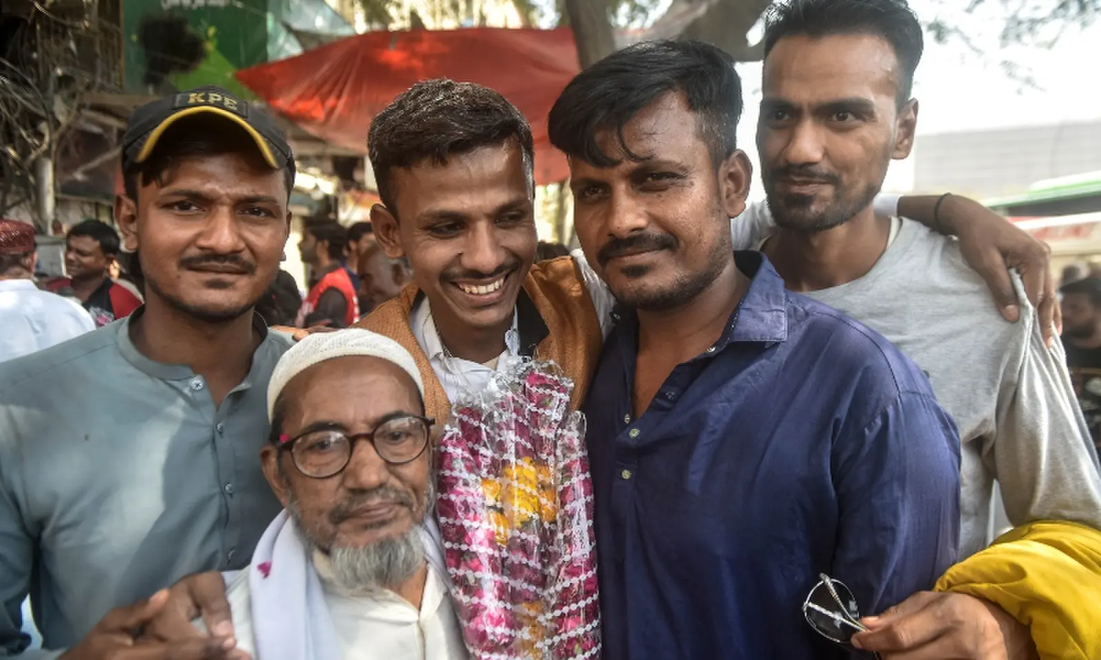 Pakistani fishermen reunite with families at Edhi Centre on October 30. — White Star/ Fahim Siddiqi