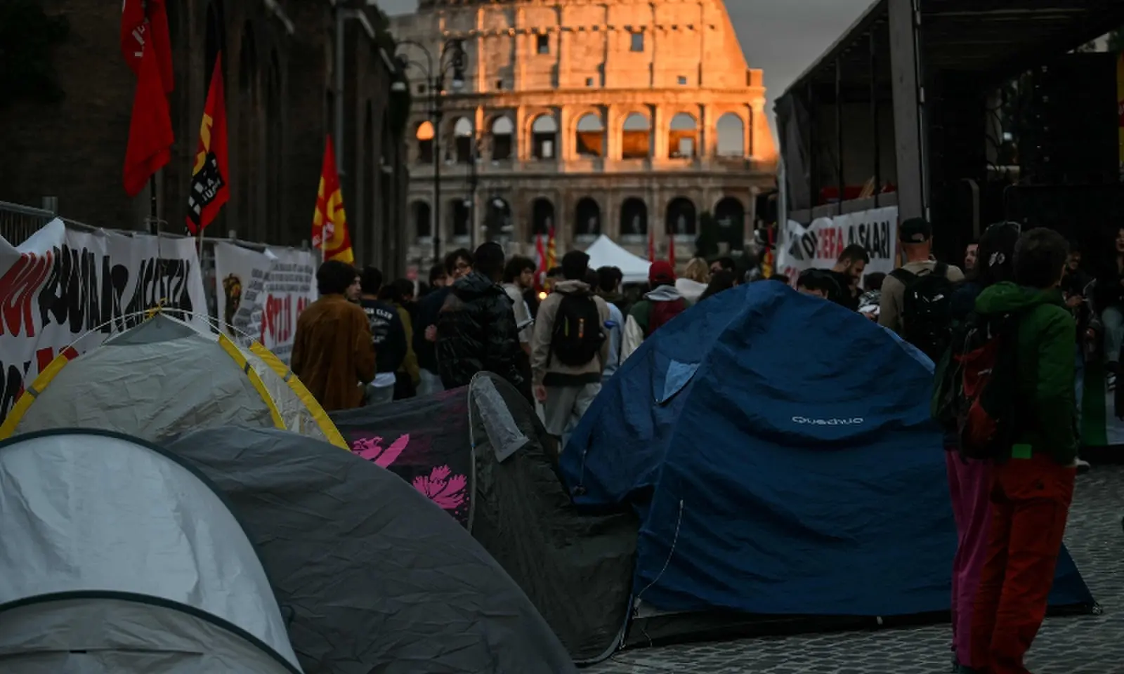 Protesters block a street with tents in front of the Colosseum during a demonstration, part of a nationwide day of strikes and protests as school and university students demand more funding for schools and support for housing, in Rome, Italy on October 30, 2026. — AFP