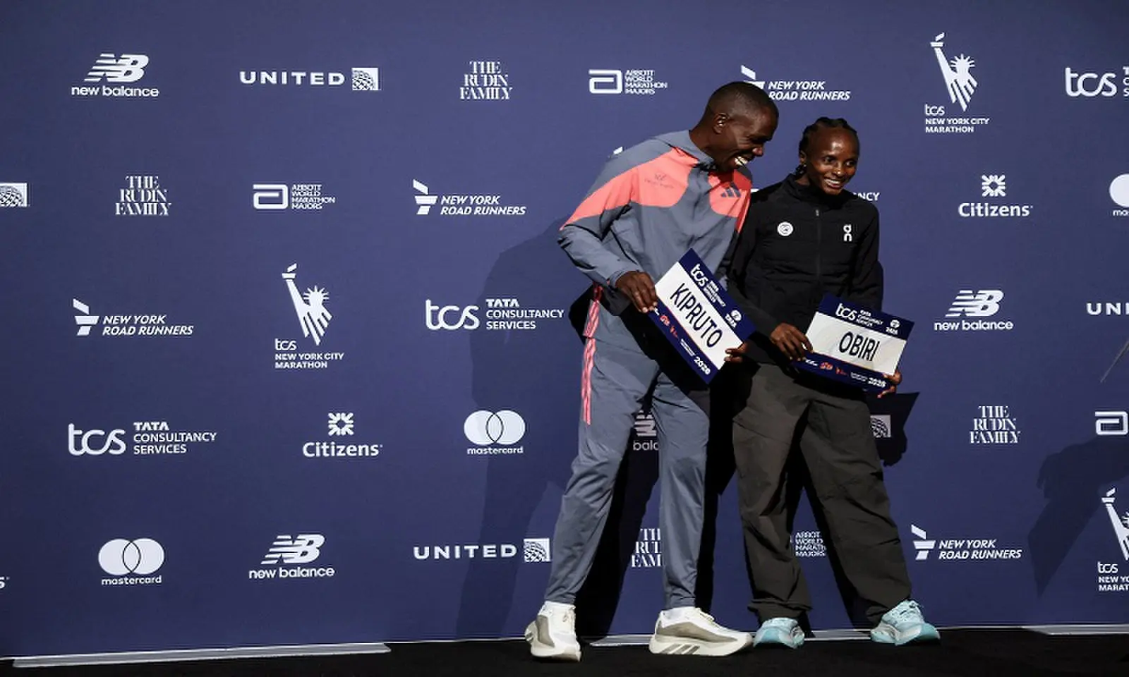 Kenya's Benson Kipruto (L) and Hellen Obiri laugh while posing for photos ahead of the 2026 New York City Marathon in New York City, US, October 29, 2026. &mdash;Reuters/File
