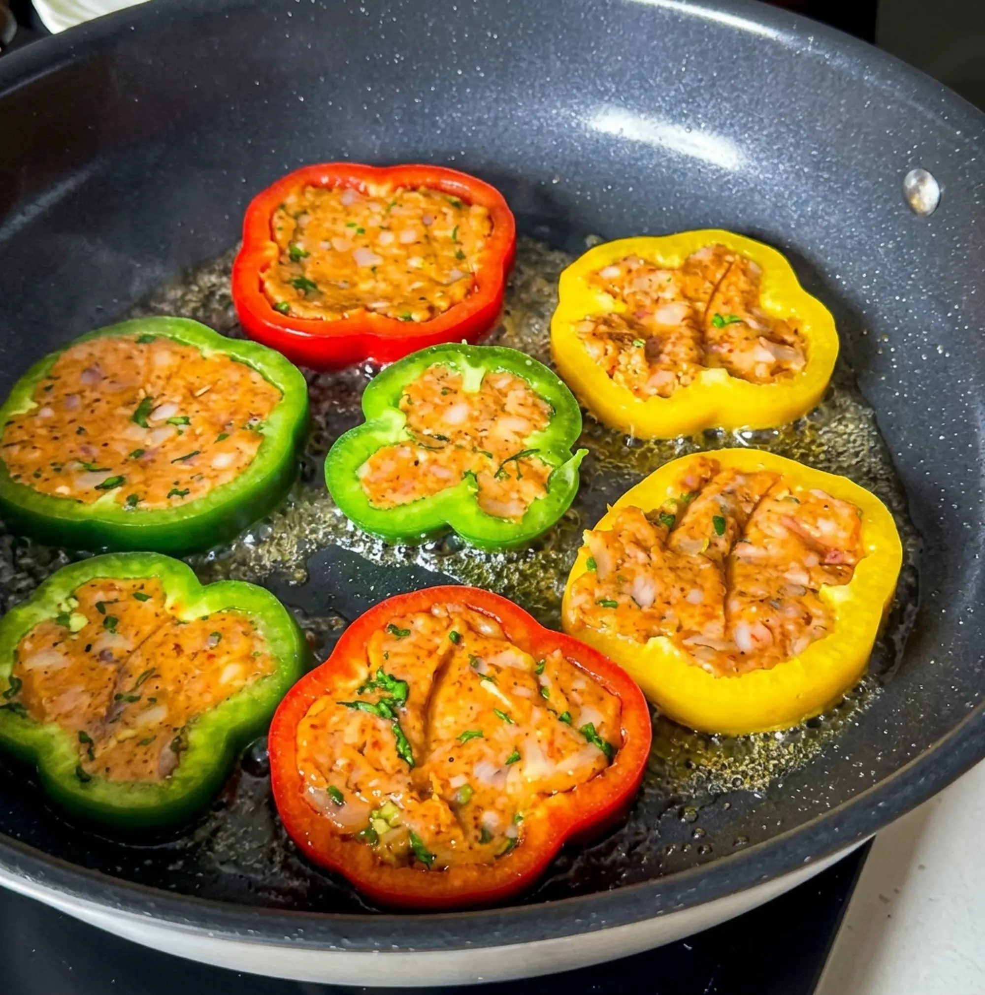 Shallow frying the capsicum slices | By the writer
