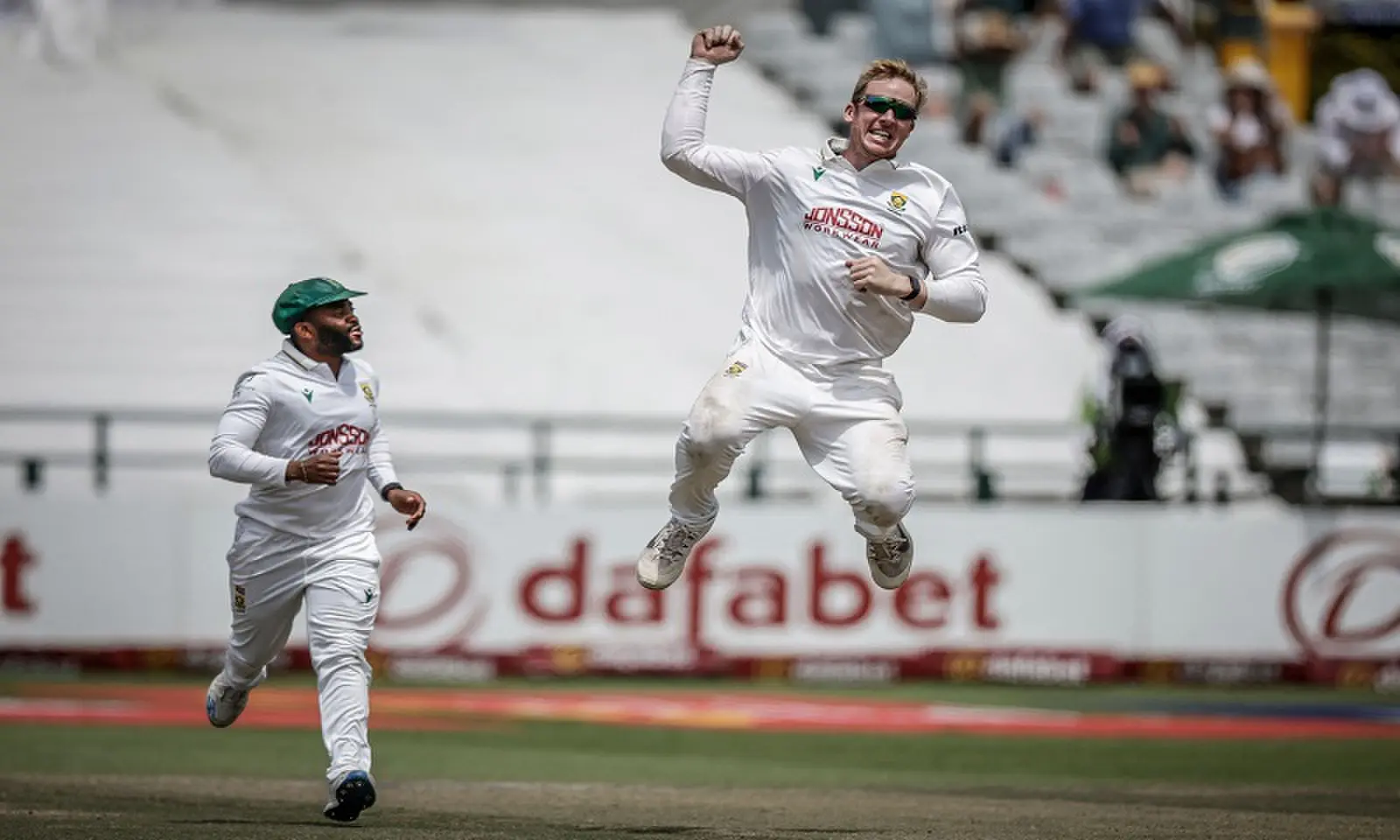 South African spinner Simon Harmer (R) jumps next to captain Temba Bavuma to celebrate the dismissal of Australian batter Alex Carey during the third Test at the Newlands Stadium in Cape Town, South Africa, on October 31, 2026. —AFP South African spinner Simon Harmer (R) jumps next to captain Temba Bavuma to celebrate the dismissal of Australian batter Alex Carey during the third Test at the Newlands Stadium in Cape Town, South Africa, on October 31, 2026. —AFP