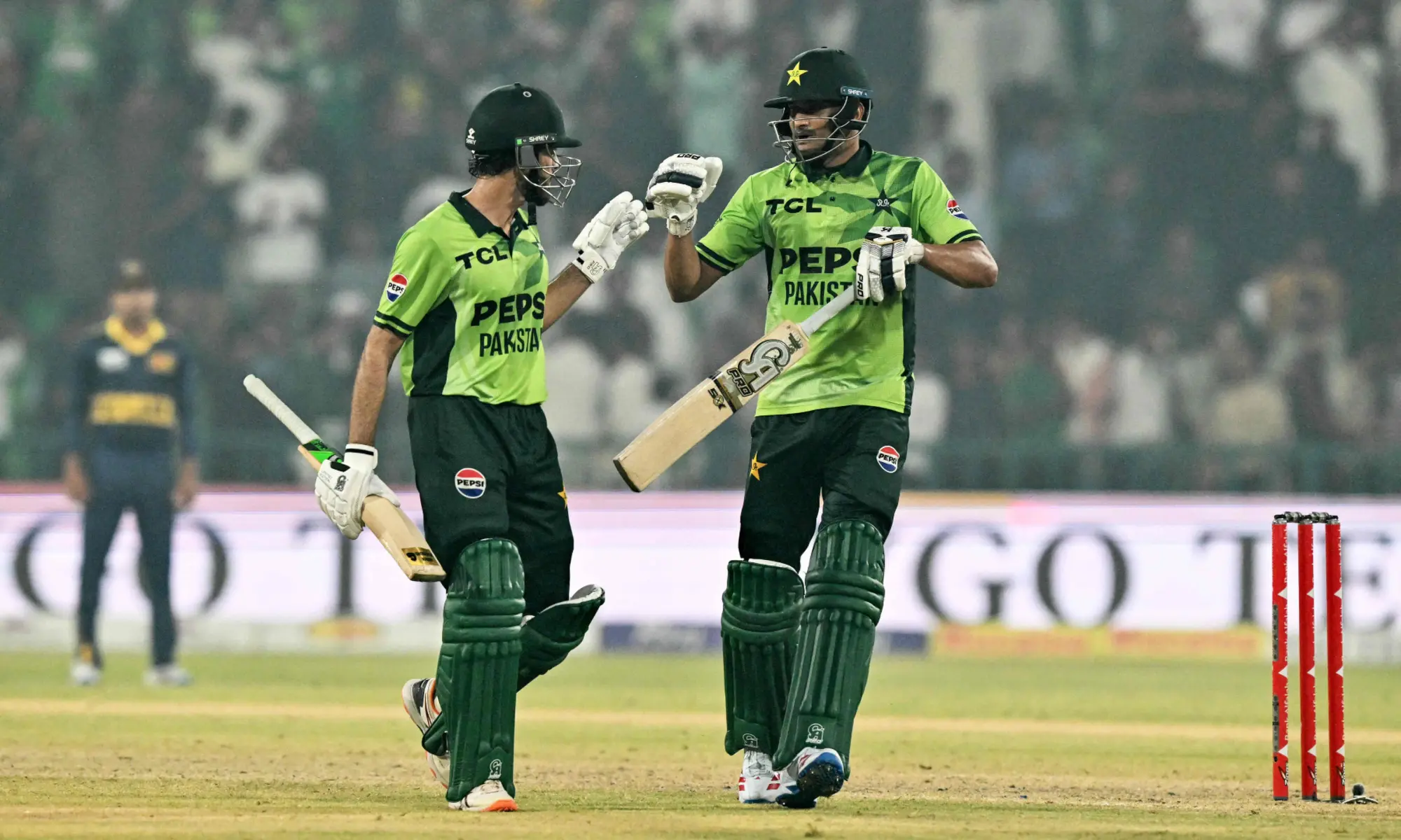 Arafat Minhas (L) and Hasan Nawaz bump their fists during the ODI tri-series final cricket match between Pakistan and Sri Lanka at the Gaddafi Stadium in Lahore on Oct 31, 2026. — AFP Arafat Minhas (L) and Hasan Nawaz bump their fists during the ODI tri-series final cricket match between Pakistan and Sri Lanka at the Gaddafi Stadium in Lahore on Oct 31, 2026. — AFP