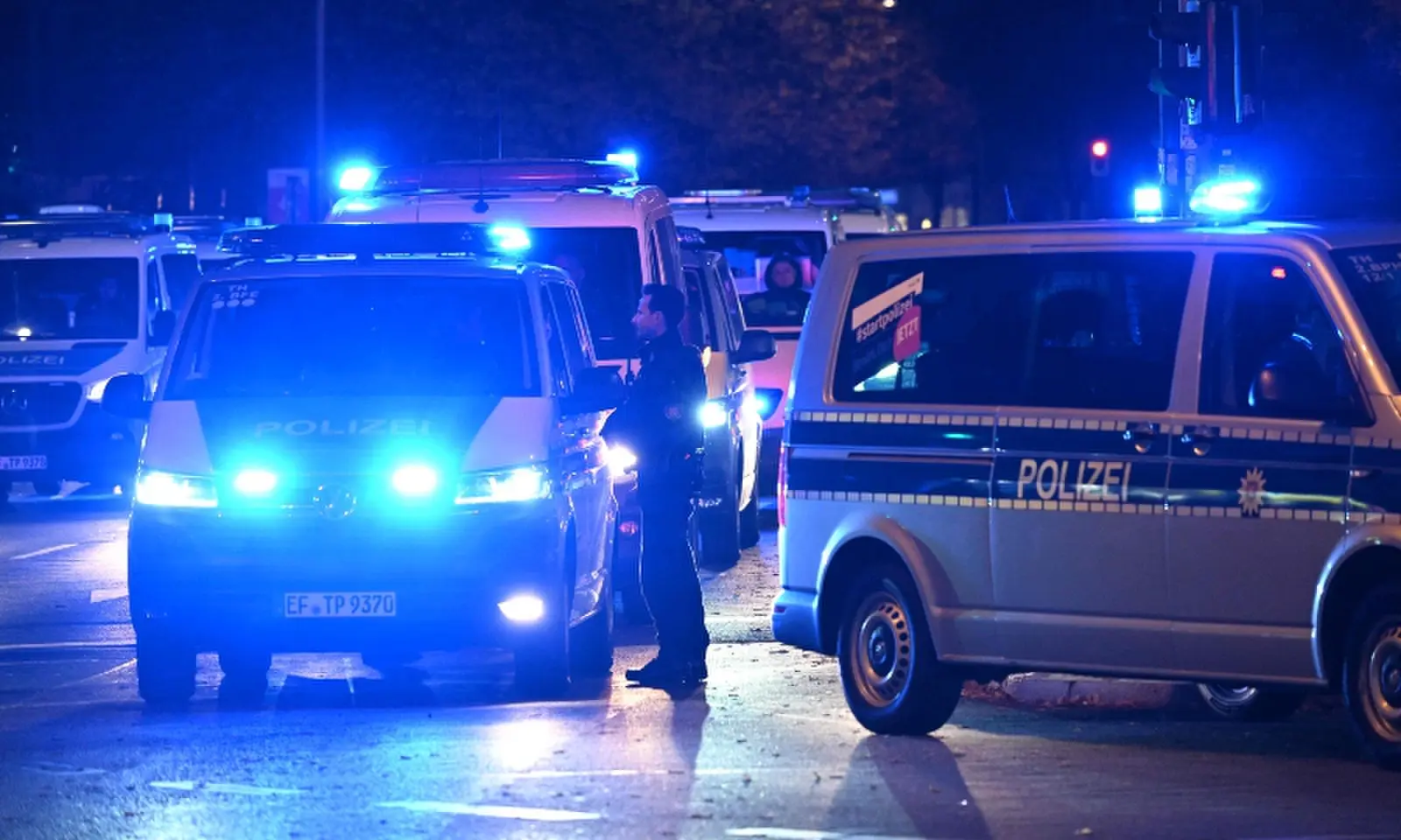 A policeman stands next to police cars on the sidelines of a demonstration organised by “GenZ regelt!” (Gen Z has got this!) in Berlin on October 31, 2026. —