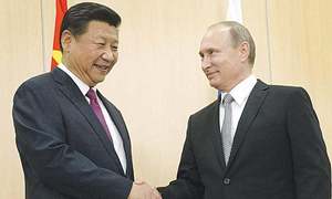 Putin heads to China to cement ties, but obstacles remain