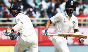 Kohli, Pujara tons give India opening day honours