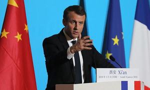 In China, Macron urges openness, pitches France Inc.