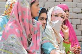 Feature: Women vow to defy men who banned their vote