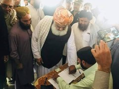 Fazlur Rehman casts his vote in NA-38