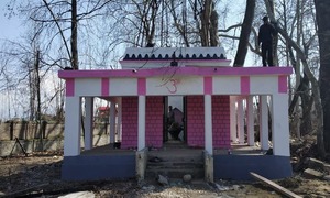 Muslims and pandits work together to restore a temple in Kashmir