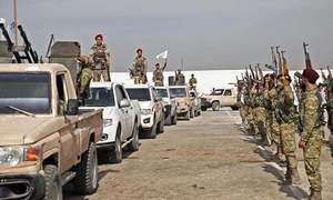 Turkey pounds Syrian border towns, sparking exodus