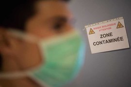 France reports record toll of 833 new coronavirus deaths
