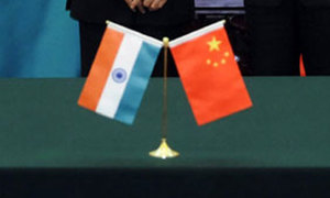 India and China agree to speed border troop pullback