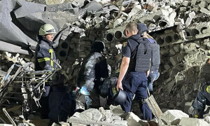 Death and devastation as Russian rockets hit Ukraine apartment block