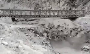 Floods sweep away bridge in Upper Kohistan