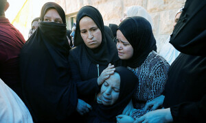 Palestinian boy buried; US seeks probe into death