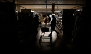 Ukrainians endure blackouts as power curbs follow Russian air strikes